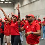 eambo facilitators guiding corporate leaders through interactive teambuilding exercises, fostering communication and problem-solving skills."