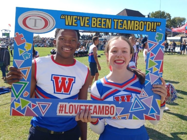 Grade 7 students participating in a fun and engaging teambuilding activity, working together to develop leadership, teamwork, and problem-solving skills in an outdoor setting.