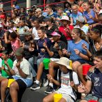 Grade 7 students participating in a fun and engaging teambuilding activity, working together to develop leadership, teamwork, and problem-solving skills in an outdoor setting.